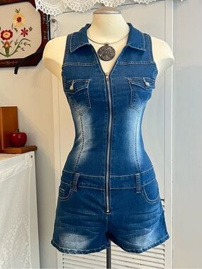 Vintage 2000s Y2K Blue denim jumpsuit with zipper front and pockets Covergirl